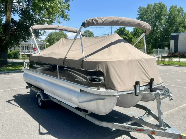 2014 PRINCECRAFT VECTRA 21 CLASSIC EDITION + MERCURY 115 H.P + ENSEMBLE SPORT 3 QUILLES + TOIT BIMINI + TOIT CAMPEUR + TOILE + REMORQUE 